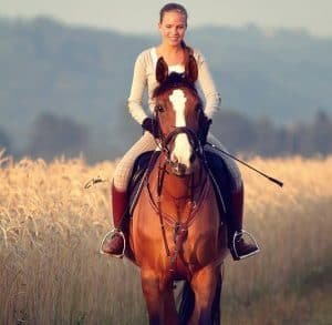 woman riding horse